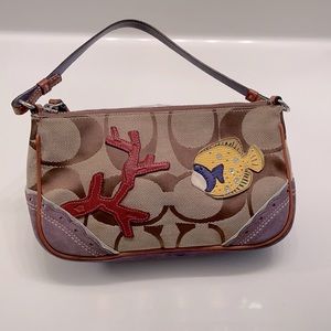 Coach purse with leather and suede